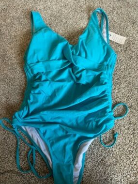 Vibrant Teal One-Piece Swimsuit with Side Ties